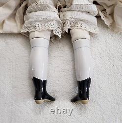 Vintage 22.5 Tall Porcelain Black Hair Cloth Body China Head Doll