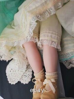 Vintage 24 inch Collectible Porcelain Doll Blonde hair Violet Eyes posable TEETH