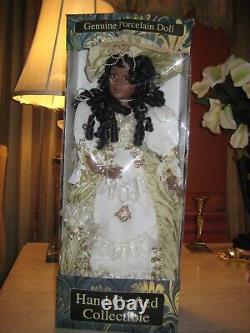 Vintage African American Porcelain Doll in Original Packaging. BRAND NEW