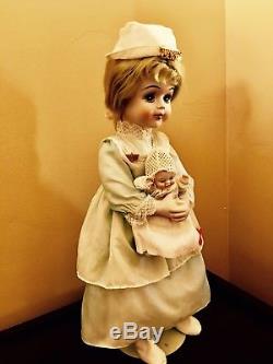 Vintage Bisque Red Cross Nurse Doll Holding Beautiful Bisque Baby Doll
