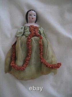 Vintage Doll with Porcelain Head, Arms and Legs and gold shoes