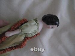 Vintage Doll with Porcelain Head, Arms and Legs and gold shoes