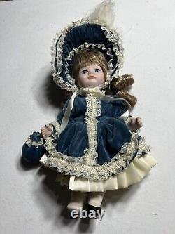 Vintage Dynasty Doll Collection Porcelain Blue Velvet with purse antique pretty