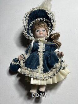 Vintage Dynasty Doll Collection Porcelain Blue Velvet with purse antique pretty