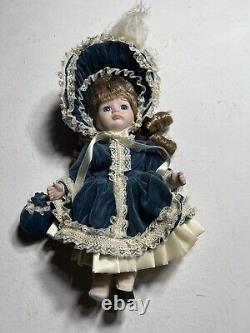 Vintage Dynasty Doll Collection Porcelain Blue Velvet with purse antique pretty