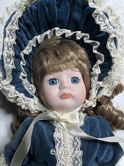 Vintage Dynasty Doll Collection Porcelain Blue Velvet with purse antique pretty