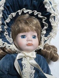 Vintage Dynasty Doll Collection Porcelain Blue Velvet with purse antique pretty