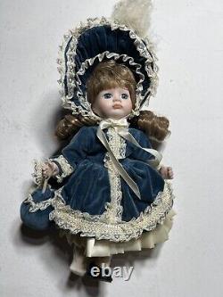 Vintage Dynasty Doll Collection Porcelain Blue Velvet with purse antique pretty