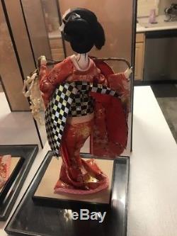 Vintage Japanese Geisha Dolls With Porcelain face and floral Kimono