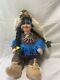 Vintage Native American Porcelin Doll With Real Animal Pelt