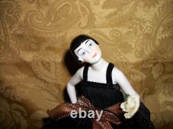 Vintage Porcelain 1/2 Doll, Deco Girl, Swivel neck, with legs, on round Box