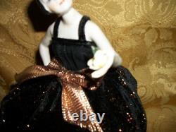 Vintage Porcelain 1/2 Doll, Deco Girl, Swivel neck, with legs, on round Box