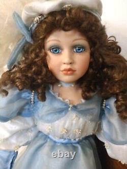 Vintage Porcelain Doll. Beautiful and in good condition. Great for a collector