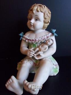 Vintage Porcelain Piano Baby Girl Holding Doll