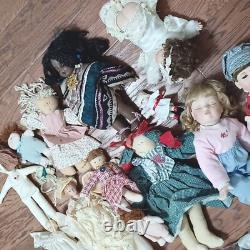 Vintage Porcelain and other dolls Lot of 23 plus some accessories and parts. PO