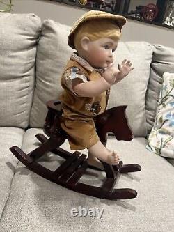 Vintage Porcelain doll Porcelain Boy On Wooden Rocking Horse Very rare