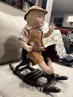 Vintage Porcelain doll Porcelain Boy On Wooden Rocking Horse Very rare