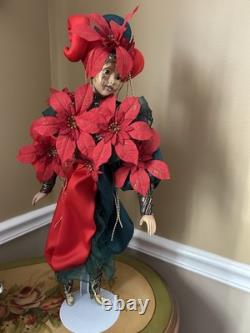 Vintage Show Stopper Mardi Grass Porcelain Xmas Doll -Poinsettia Design