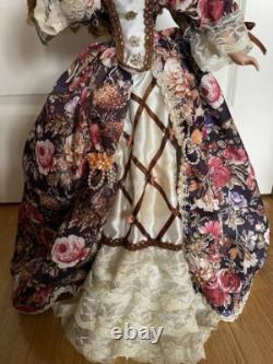 Vintage Victorian Porcelain Doll with curly hair