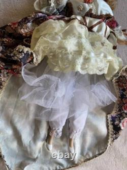 Vintage Victorian Porcelain Doll with curly hair Vintage Victorian Porcelain Doll with curly hair