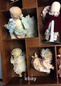 Vintage Wall Mount Shelf With Porcelain Dolls. Collectible Dolls Size 7