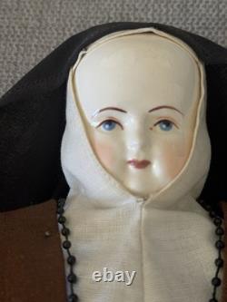 Vintage or Antique china head solid dome 18 inch Nun doll. Please read