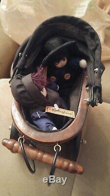 Vintage springford amish dolls with handmade carriage