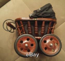 Vintage springford amish dolls with handmade carriage