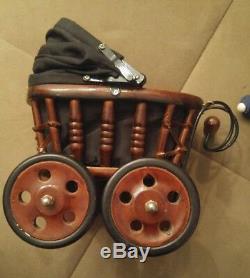 Vintage springford amish dolls with handmade carriage