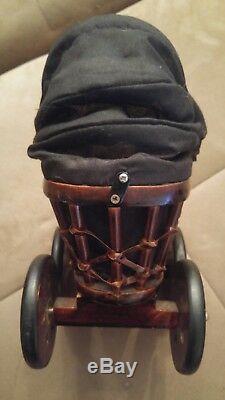 Vintage springford amish dolls with handmade carriage