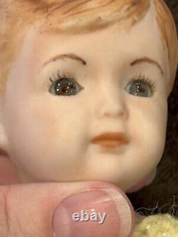 Vtg ARTISAN PORCELAIN BABY DOLL Brown Glass Eyes Bisque Jointed-Limbs 9 inches