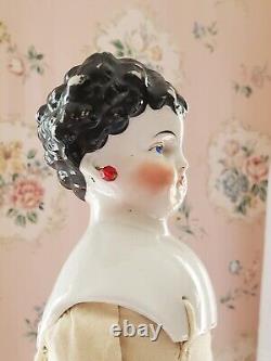 15 belles rares têtes de china antique Conta & Boehme dame aux oreilles percées à bottes plates