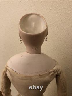 17 François Gaultier (F. G.) Poupée Bisque avec Corps en Cuir (déchirure au coude gauche)