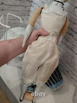 21 poupée Clarmaid à tête en bisque, jolie robe