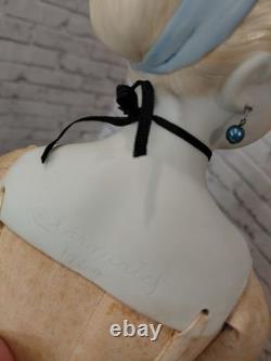 21 poupée Clarmaid à tête en bisque, jolie robe
