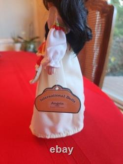 Ensemble de 11 poupées souvenirs internationales vintage