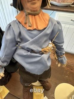 Ensemble de 4 poupées en porcelaine Franklin Heirloom Le Magicien d'Oz avec papiers en très bon état