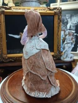 Figurine de poupée en porcelaine vintage vendeuse de melons
