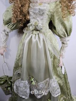 La collection Knightsbridge : grande poupée en porcelaine de 44 cm, style victorien, avec chapeau et parapluie