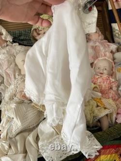 Neuf poupées antiques/vintage uniques à trois visages : heureuse, en pleurs, endormie, plus beaucoup de tissus
