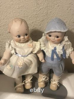 Paire de poupées en porcelaine Vintage 15 avec corps en cuir et yeux Googly