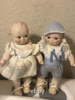 Paire de poupées en porcelaine Vintage 15 avec corps en cuir et yeux Googly