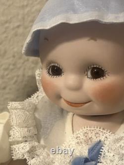 Paire de poupées en porcelaine Vintage 15 avec corps en cuir et yeux Googly