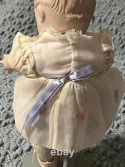 Paire de poupées en porcelaine Vintage 15 avec corps en cuir et yeux Googly