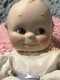 Paire de poupées en porcelaine Vintage 15 avec corps en cuir et yeux Googly