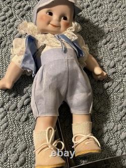 Paire de poupées en porcelaine Vintage 15 avec corps en cuir et yeux Googly