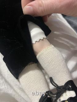 Paire de poupées en porcelaine Vintage 15 avec têtes à douille, corps en cuir et yeux Googly