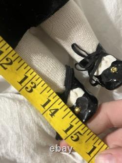 Paire de poupées en porcelaine Vintage 15 avec têtes à douille, corps en cuir et yeux Googly