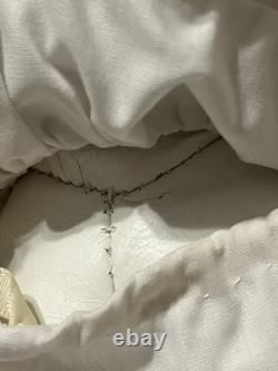 Paire de poupées en porcelaine Vintage 15 avec têtes à douille, corps en cuir et yeux Googly