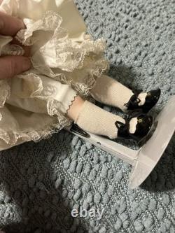 Paire de poupées en porcelaine Vintage 15 avec têtes à douille, corps en cuir et yeux Googly